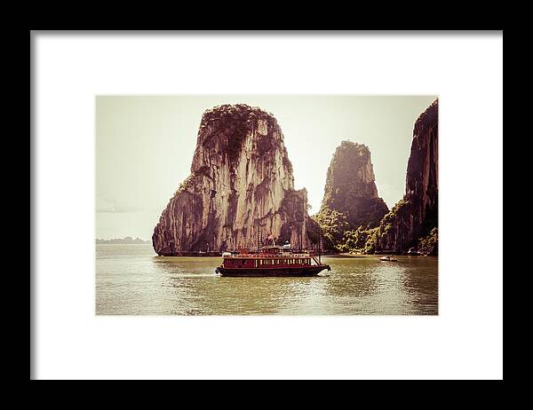 Scenics Framed Print featuring the photograph Vietnamese Junk Cruising On Halong Bay by Fototrav
