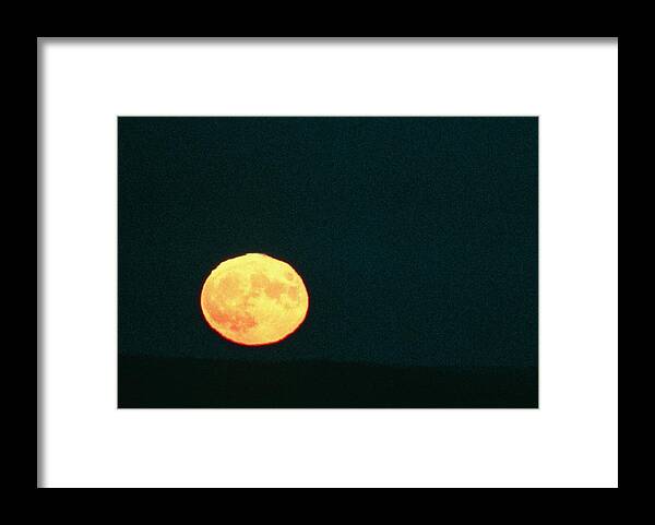 Full Moon Framed Print featuring the photograph View Of The Distorted Disc Of A Full Moon by Pekka Parviainen/science Photo Library