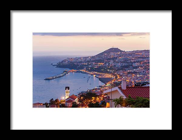 Town Framed Print featuring the photograph View Over Funchal At Dusk, Madeira by Peter Adams