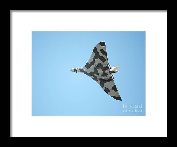 Vulcan Bomber Framed Print featuring the photograph Vulcan bomber in flight by Paul Cowan