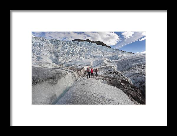 Headwear Framed Print featuring the photograph Walking On A Glacier by Subtik