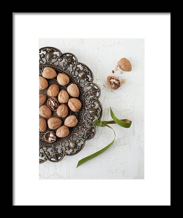 Newtown Framed Print featuring the photograph Walnuts by Yelena Strokin