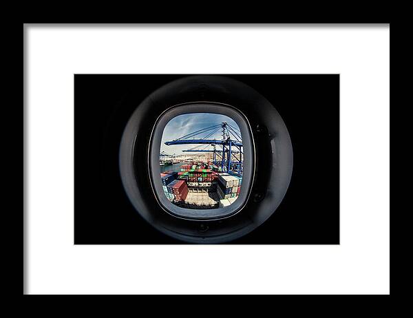 Window Framed Print featuring the photograph Watching A Container Ship Being Loaded by Tim Martin