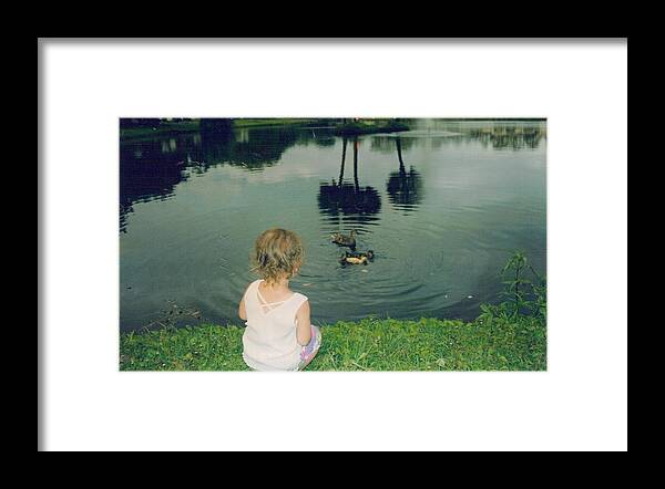 Toddler Framed Print featuring the photograph Watching Baby Ducks by Debbie Wassmann