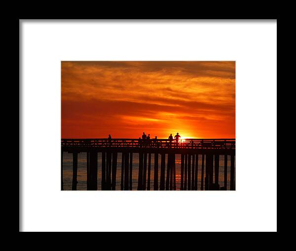 Sunset Framed Print featuring the photograph Watching the Sun Set by Amelia Racca
