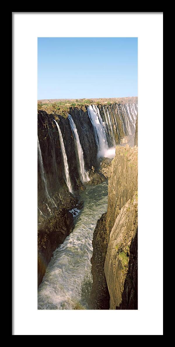 Photography Framed Print featuring the photograph Water Falling Through Rocks In A River by Panoramic Images