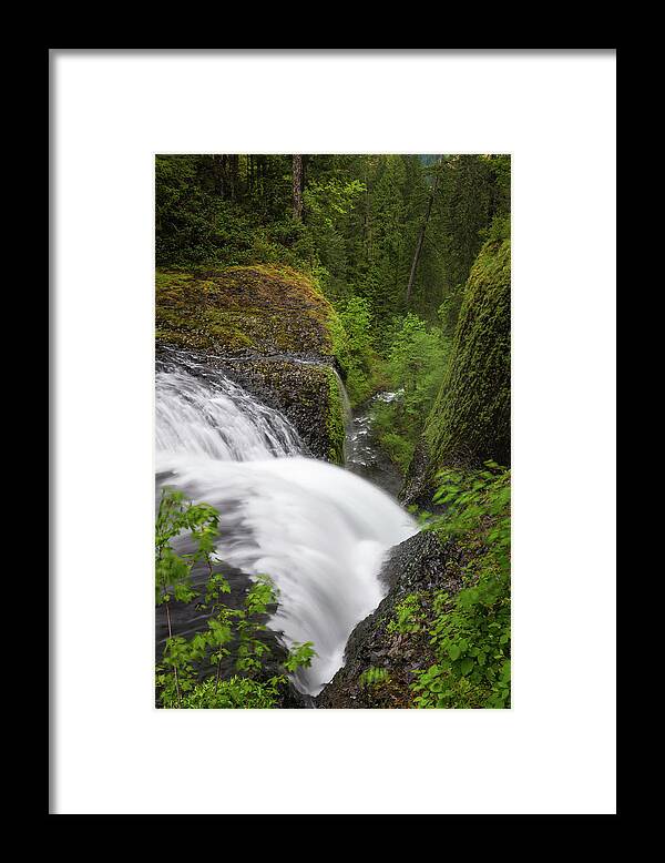 Scenics Framed Print featuring the photograph Waterfall Cascading Down Narrow Forest by Fotovoyager