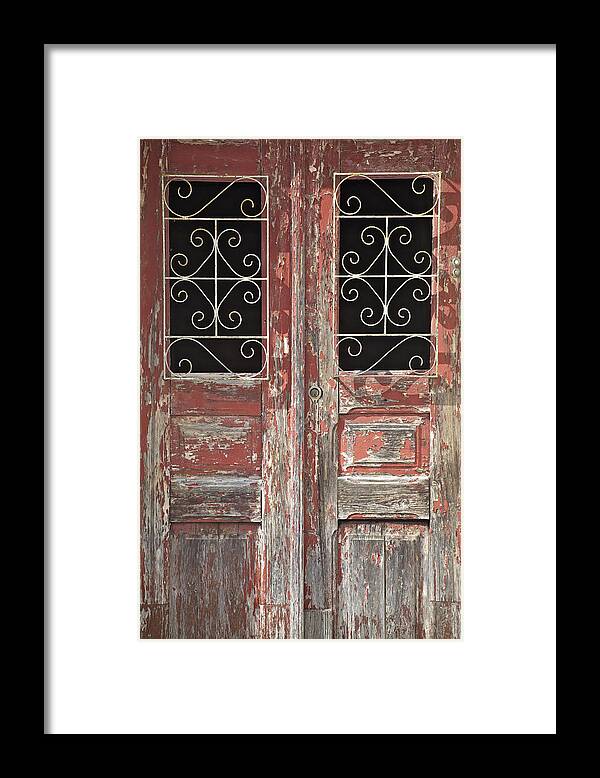 Artistic Framed Print featuring the photograph Weathered Red Wood Rustic Door with Peeling Paint by David Letts