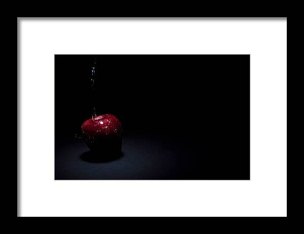 Apple Framed Print featuring the photograph Wet Apple by Paul Watkins