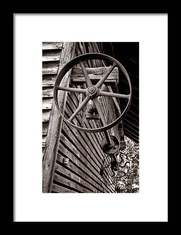Cast Framed Print featuring the photograph Wheel of Labor by Olivier Le Queinec
