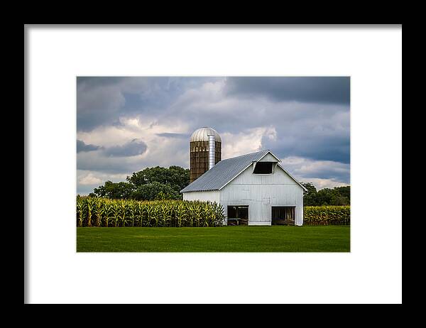 Art Framed Print featuring the photograph White Barn and Silo with Storm Clouds by Ron Pate