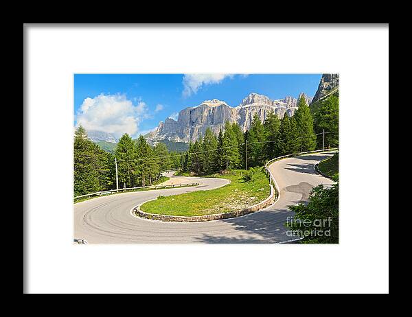 Alps Framed Print featuring the photograph 	winding road to Pordoi pass by Antonio Scarpi