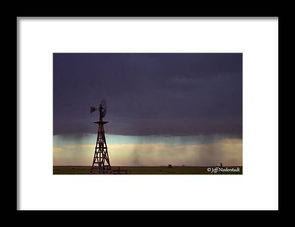 Storms Framed Print featuring the photograph Windmill in the rain by Jeff Niederstadt
