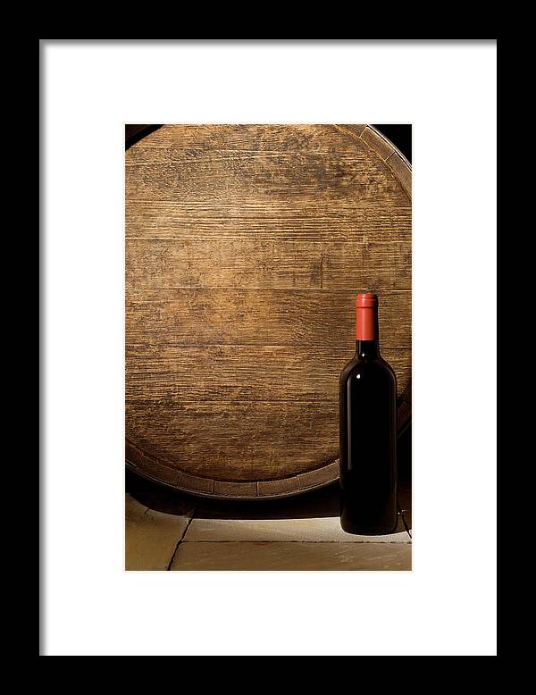 Alcohol Framed Print featuring the photograph Wine Barrel And Bottle by Markswallow