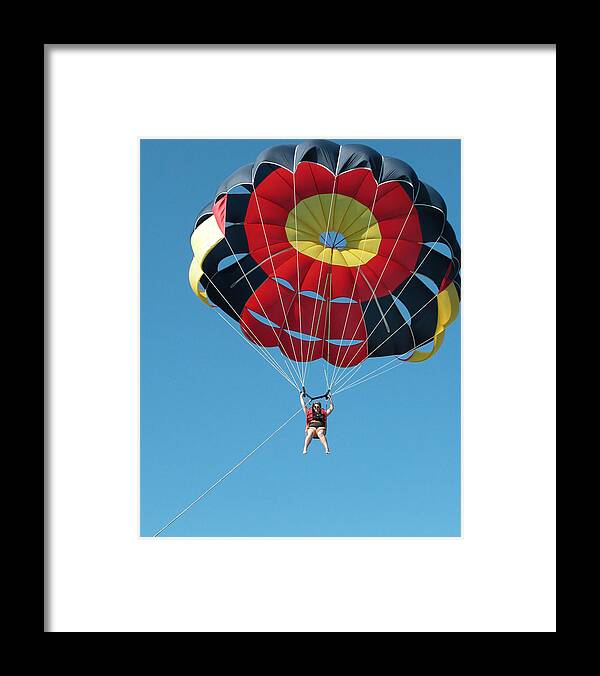 Pixels Framed Print featuring the photograph Woman Parasailing by Rob Huntley