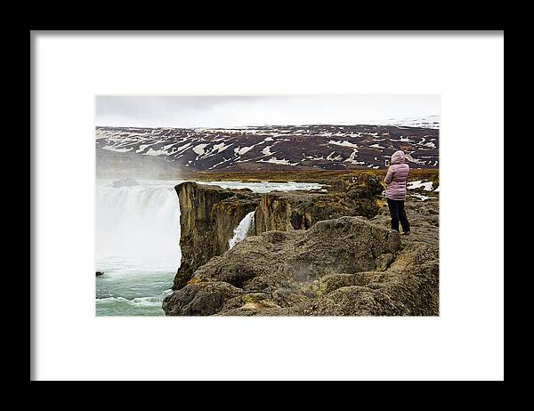 Caucasian Ethnicity Framed Print featuring the photograph Woman Standing On Rock And Watching by Blake Burton