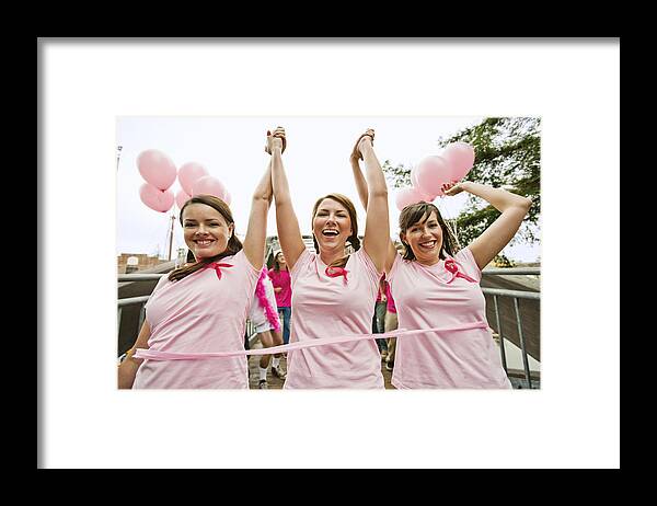 Petaluma Framed Print featuring the photograph Women run in breast cancer marathon by AE Pictures Inc.