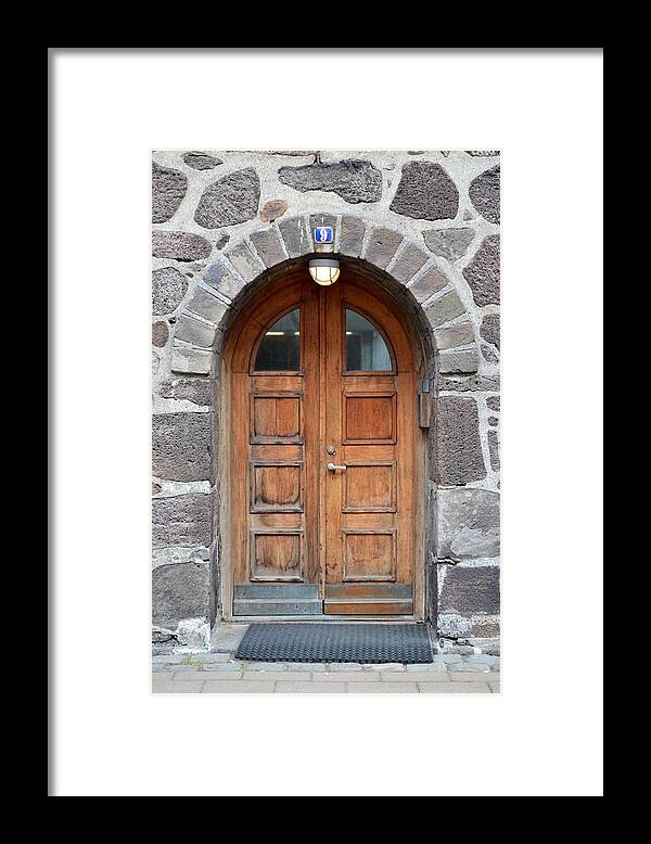 Iceland Framed Print featuring the photograph Wood Arch door Iceland by Paula Deutz