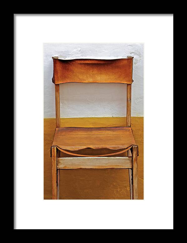 Artistic Framed Print featuring the photograph Worn Leather Outdoor Cafe Chair by David Letts