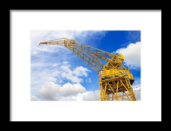 Architecture Framed Print featuring the photograph Yellow Crane and Sky by Jess Kraft