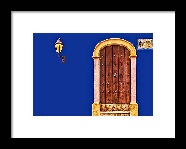 Architecture Framed Print featuring the photograph Door and Lamp by Maria Coulson