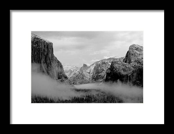 Yosemite Framed Print featuring the photograph Yosemite Tunnel View on a Snowy Foggy Morning by Daniel Woodrum