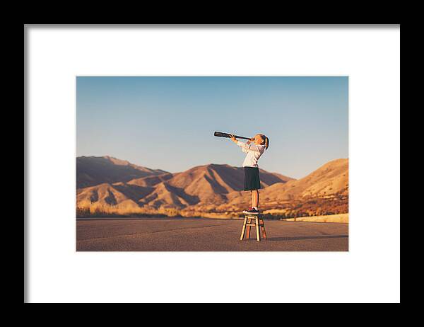 Expertise Framed Print featuring the photograph Young Business Girl Looks through Telescope by RichVintage