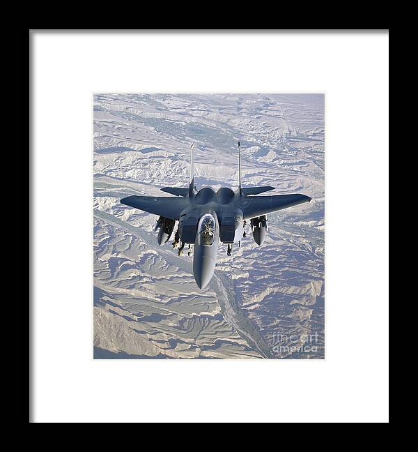 Color Image Framed Print featuring the photograph An F-15e Strike Eagle Soars #1 by Stocktrek Images