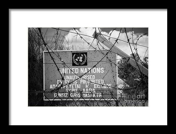 United Framed Print featuring the photograph Restricted area of the UN buffer zone in the green line dividing north and south cyprus #2 by Joe Fox