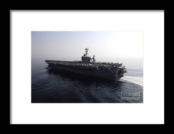 Uss John C Stennis Framed Print featuring the photograph The Nimitz-class Aircraft Carrier Uss #7 by Stocktrek Images