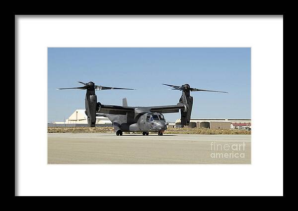 Airbase Framed Print featuring the photograph A Cv-22 Osprey Prepares For Take-off by Stocktrek Images