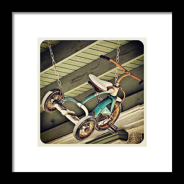 Antique Framed Print featuring the photograph A Tricycle Hanging In Arcadia, Florida by Troy Thomas