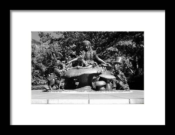 Central Park Framed Print featuring the photograph ALICE IN WONDERLAND in CENTRAL PARK in BLACK AND WHITE by Rob Hans