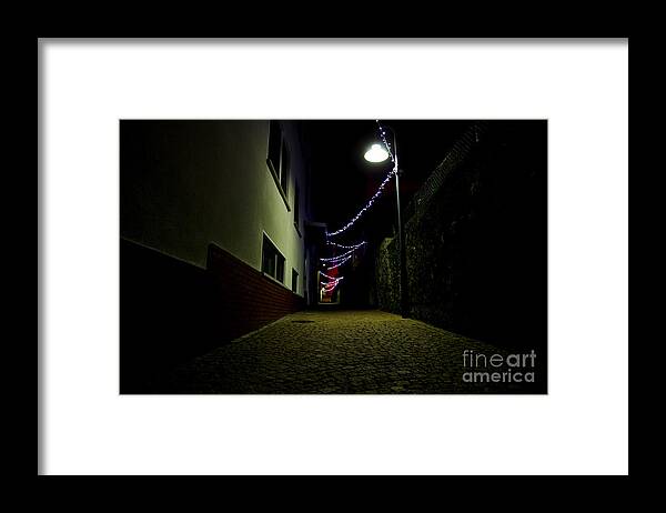 Alley Framed Print featuring the photograph Alley with lights by Mats Silvan