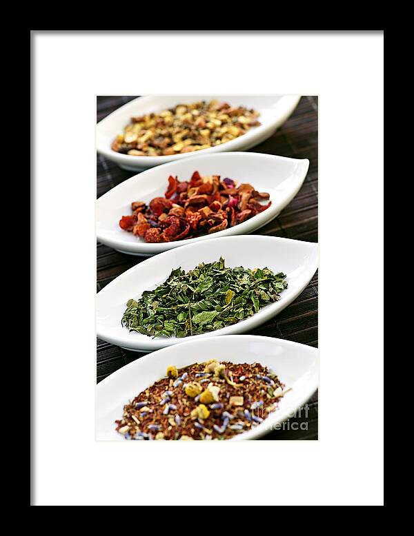 Tea Framed Print featuring the photograph Assorted herbal wellness dry tea in bowls by Elena Elisseeva