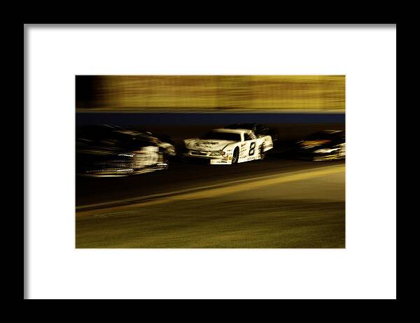 Motorsports Framed Print featuring the photograph At Speed by Michael Nowotny