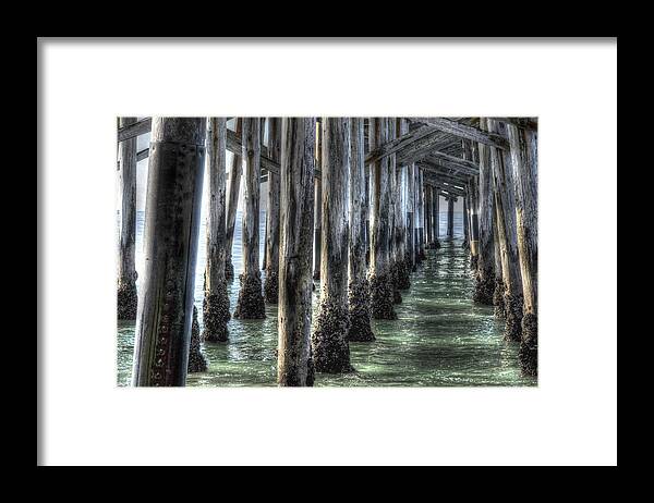 Balboa Pier Framed Print featuring the photograph Balboa Pylons by Richard Omura