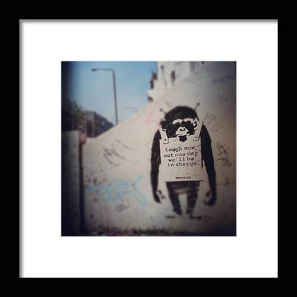 Banksy Framed Print featuring the photograph Banksy by Milene Milan
