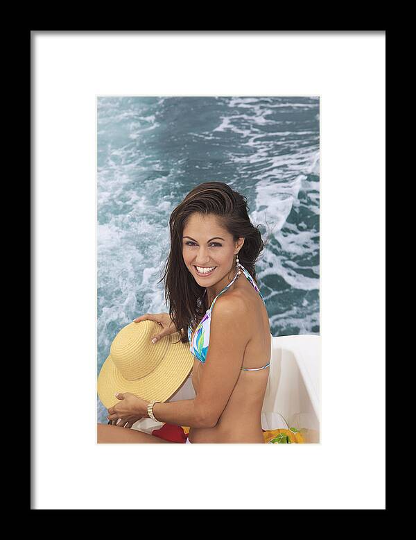 Attractive Framed Print featuring the photograph Beautiful Girl Boating by Tomas del Amo - Printscapes