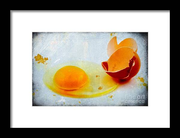 Egg Framed Print featuring the photograph Broken egg by Silvia Ganora
