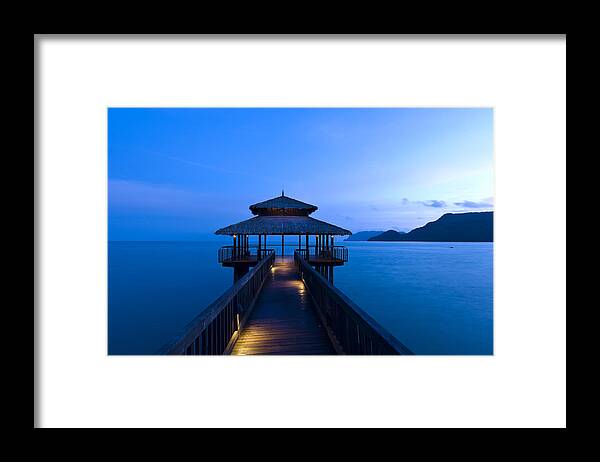 Beautiful Framed Print featuring the photograph Building at the end of a jetty during twilight by U Schade