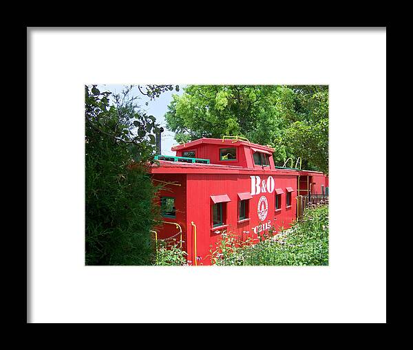 Caboose Framed Print featuring the photograph Caboose in the Trees by Charles Robinson