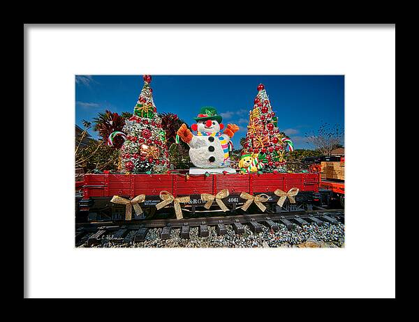 Snowman Framed Print featuring the photograph Christmas Snowman On Rails by Christopher Holmes