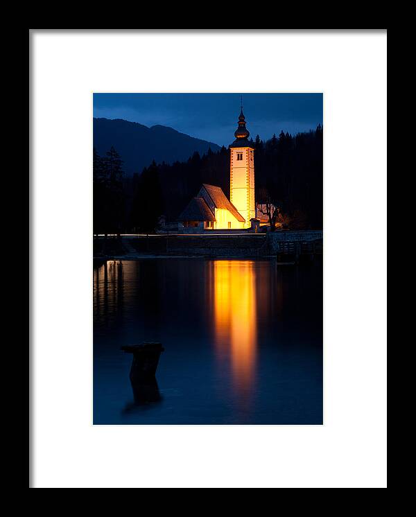 Bohinj Framed Print featuring the photograph Church at dusk by Ian Middleton