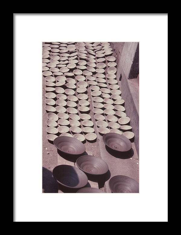 Hand-thrown Pottery Framed Print featuring the photograph Clay Yogurt Cups Drying In The Sun by David Sherman