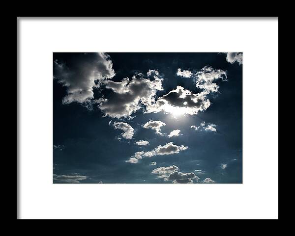 Clouds Framed Print featuring the photograph Clouds on a sunny day by Sumit Mehndiratta