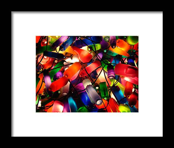 Colorful Lit Framed Print featuring the photograph Colorful lit water bottles by Sumit Mehndiratta