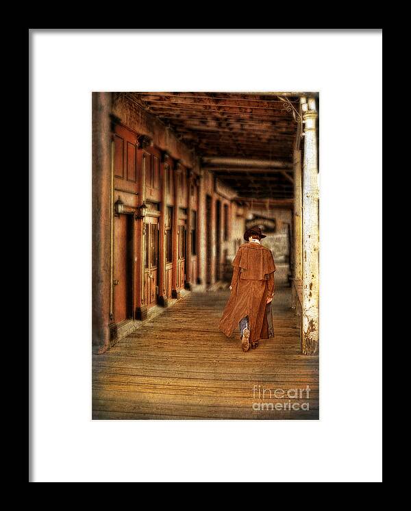 Cowboy Boots Framed Print featuring the photograph Cowboy in Old West Town by Jill Battaglia