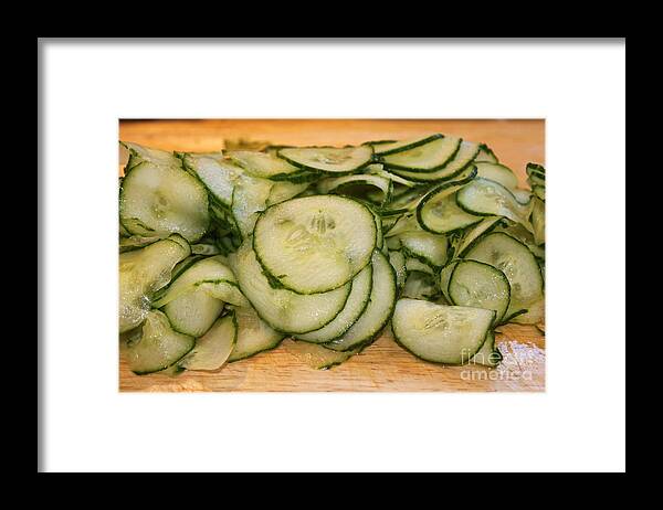 Meal Framed Print featuring the photograph Cucumbers by Henrik Lehnerer