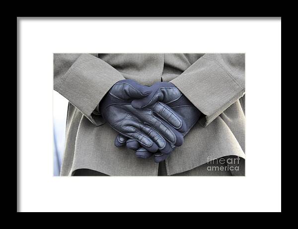 Hands Behind Back Framed Print featuring the photograph Despite Light Rain And A Chilling by Stocktrek Images